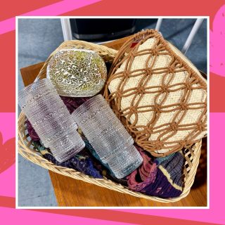 A Galentine's gift basket full of thrifted accessories and home decor catered to a boho style.