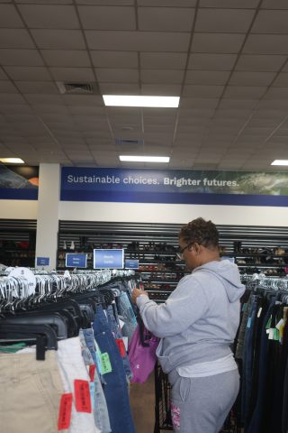 Shopper browsing bottoms