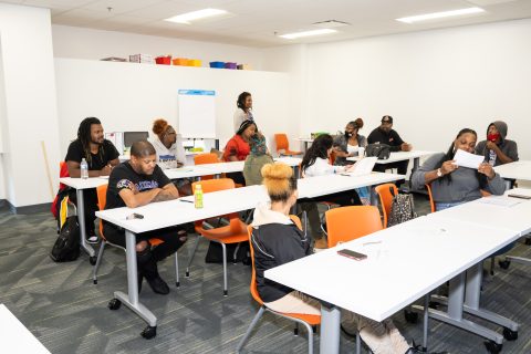 graduates in a classroom at the adult highschool